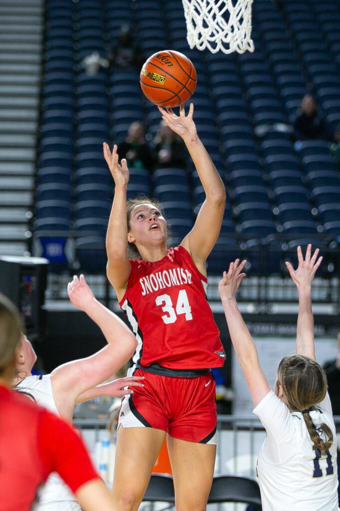 Snohomish’s Tyler Gildersleeve-Stiles scores from the post during a WIAA 3A Girls Basketball quarterfinal against Arlington on Thursday, Feb. 29, 2024, at the Tacoma Dome in Tacoma, Washington. (Ryan Berry / The Herald)
