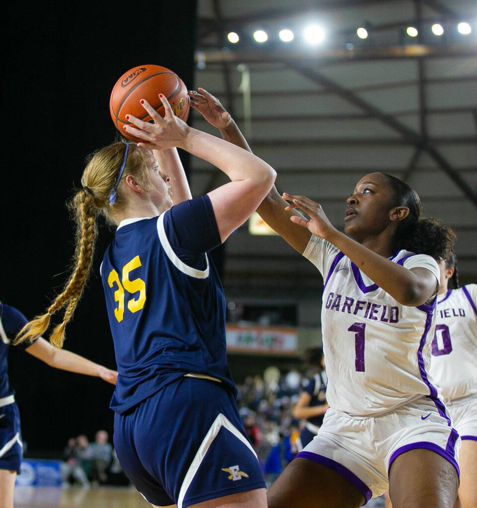 Everett’s Emily Barton sinks a shot from the post during a WIAA 3A Girls Basketball quarterfinal against Garfield on Thursday, Feb. 29, 2024, at the Tacoma Dome in Tacoma, Washington. (Ryan Berry / The Herald)
