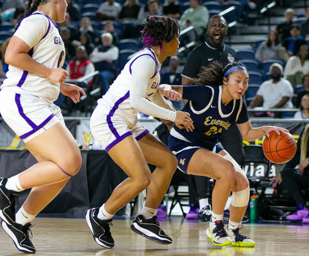 Everett senior Bella Nguon dries to get to the paint during a WIAA 3A Girls Basketball quarterfinal against Garfield on Thursday, Feb. 29, 2024, at the Tacoma Dome in Tacoma, Washington. (Ryan Berry / The Herald)
