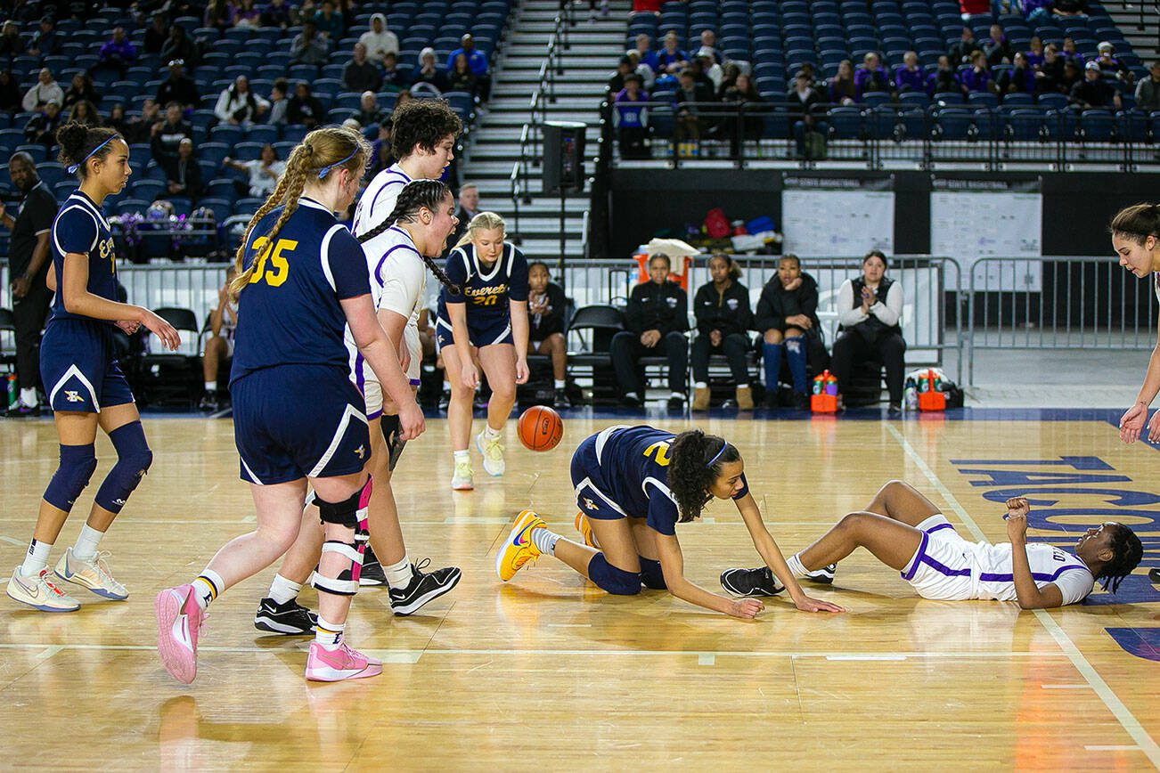 Everett’s Alana Washington is called for an offensive foul during a WIAA 3A Girls Basketball quarterfinal against Garfield on Thursday, Feb. 29, 2024, at the Tacoma Dome in Tacoma, Washington. (Ryan Berry / The Herald)