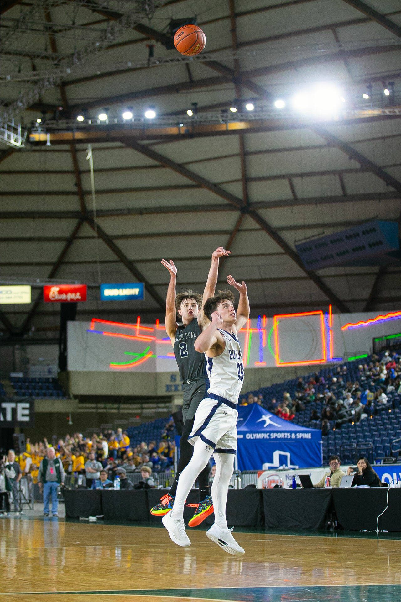 Glacier Peak’s Jo Lee nails a three while shooting with a hot hand in the fourth quarter of a WIAA 4A Boys Basketball quarterfinal against Gonzaga Prep on Thursday, Feb. 29, 2024, at the Tacoma Dome in Tacoma, Washington. (Ryan Berry / The Herald)