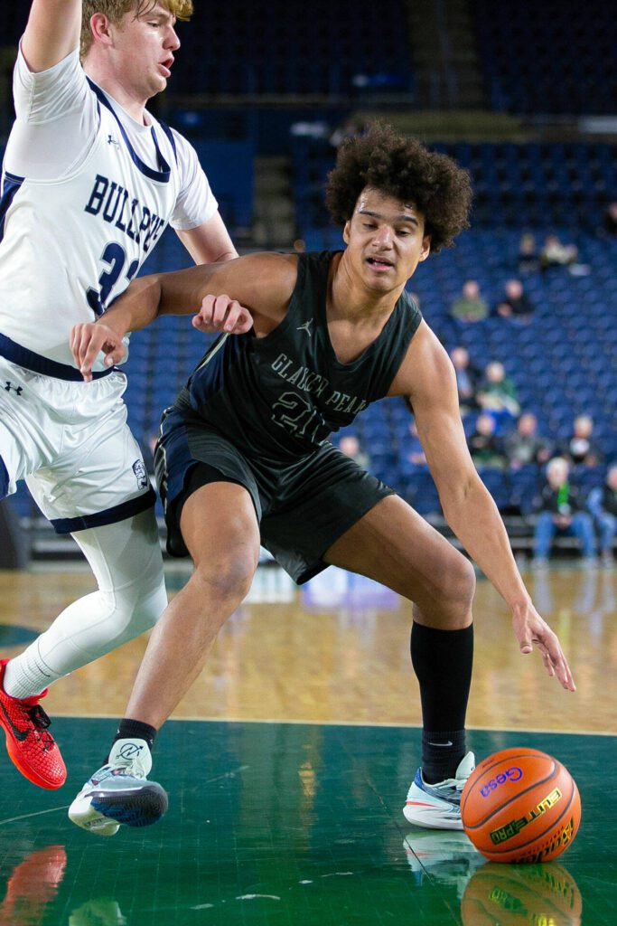 Glacier Peak junior Jayce Nelson tries to back down an opponent during a WIAA 4A Boys Basketball quarterfinal against Gonzaga Prep on Thursday, Feb. 29, 2024, at the Tacoma Dome in Tacoma, Washington. (Ryan Berry / The Herald)
