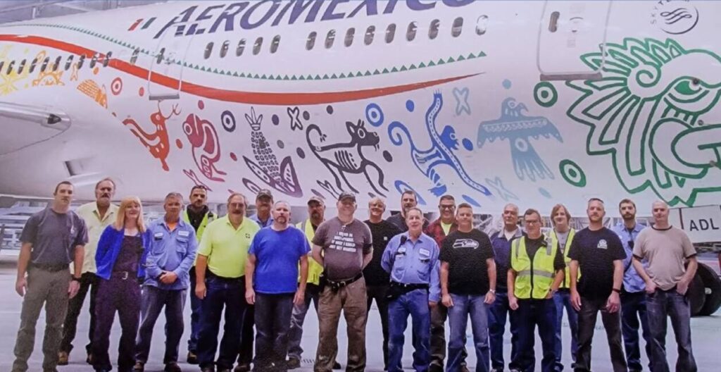 Rachel (third from left) and her all-male Crane Mechanic team in 2015. (Provided by Court records)
