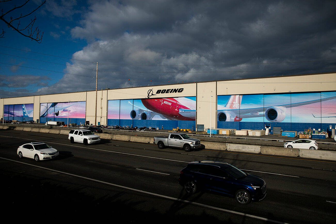 Traffic moves along Highway 526 in front of Boeing’s Everett Production Facility on Nov. 28, 2022, in Everett, Washington. (Olivia Vanni / Sound Publishing)