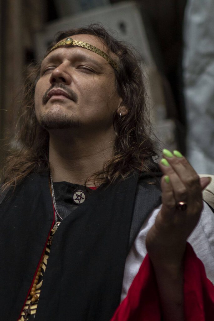 Archpriest Dusty Dionne leads the Circle during the Lavender Wishes ritual for Litha, another name for the summer solstice, at the Aquarian Tabernacle Church in Index, Washington, in June 2023. Litha marks the beginning of summer. (Annie Barker / The Herald)
