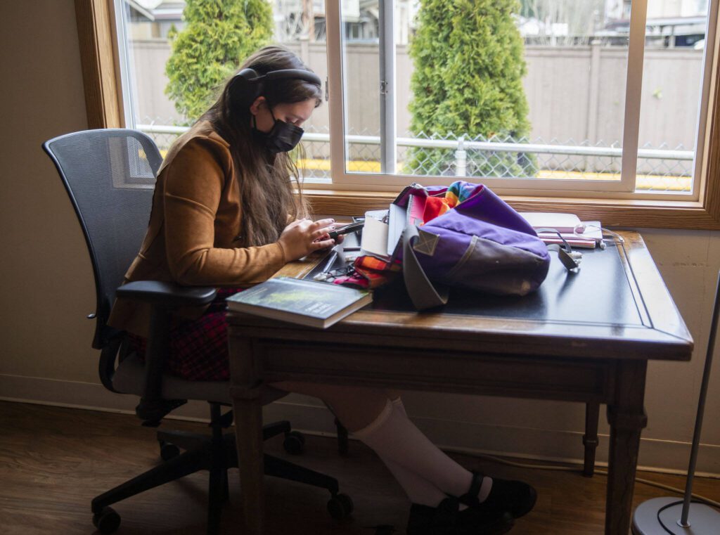 Kali Kelbert, 17, works on notes at Clearwater School on Thursday, Jan. 25, 2024 in Bothell, Washington. (Olivia Vanni / The Herald)
