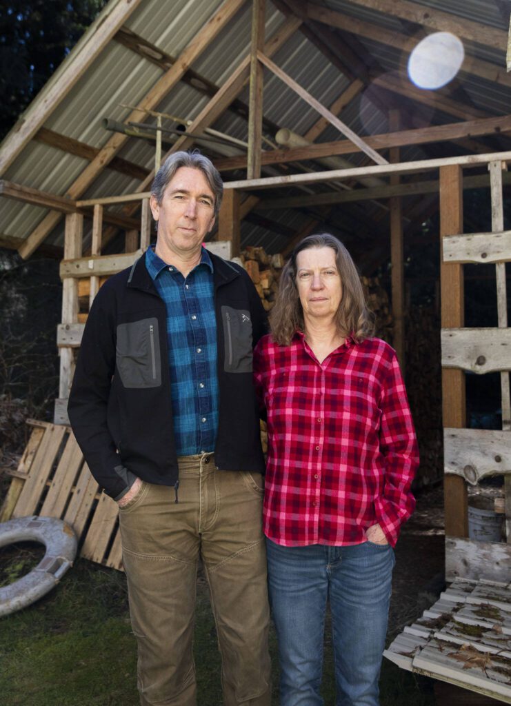 Scott and Erika Morris at their home on Monday, March 18, 2024. Both are members of the Darrington Historical Society. (Olivia Vanni / The Herald)
