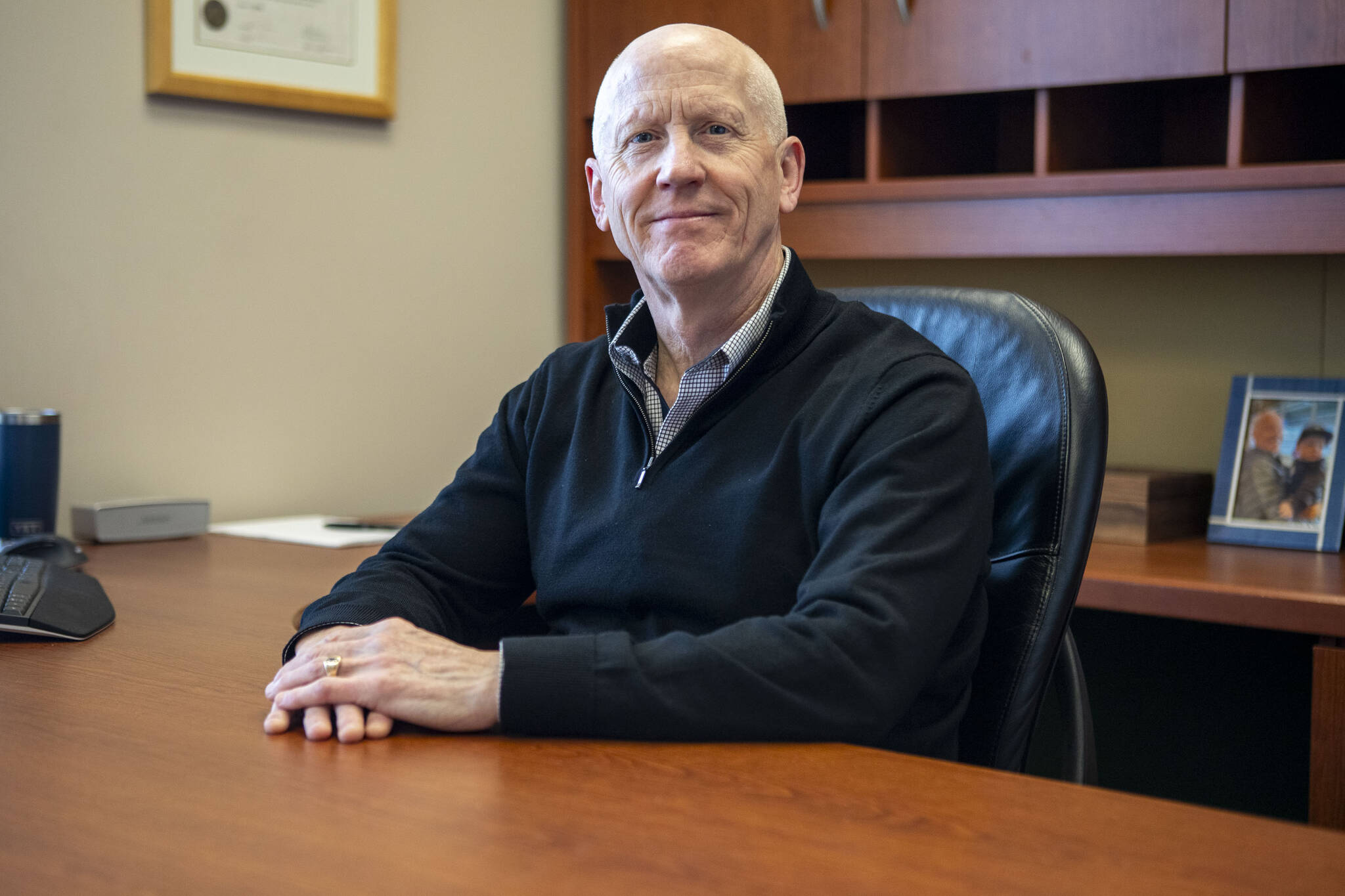 Mark Duffy poses for a photo in his office at the Mountain Pacific Bank headquarters on Wednesday, Feb. 14, 2024 in Everett, Washington. (Annie Barker / The Herald)