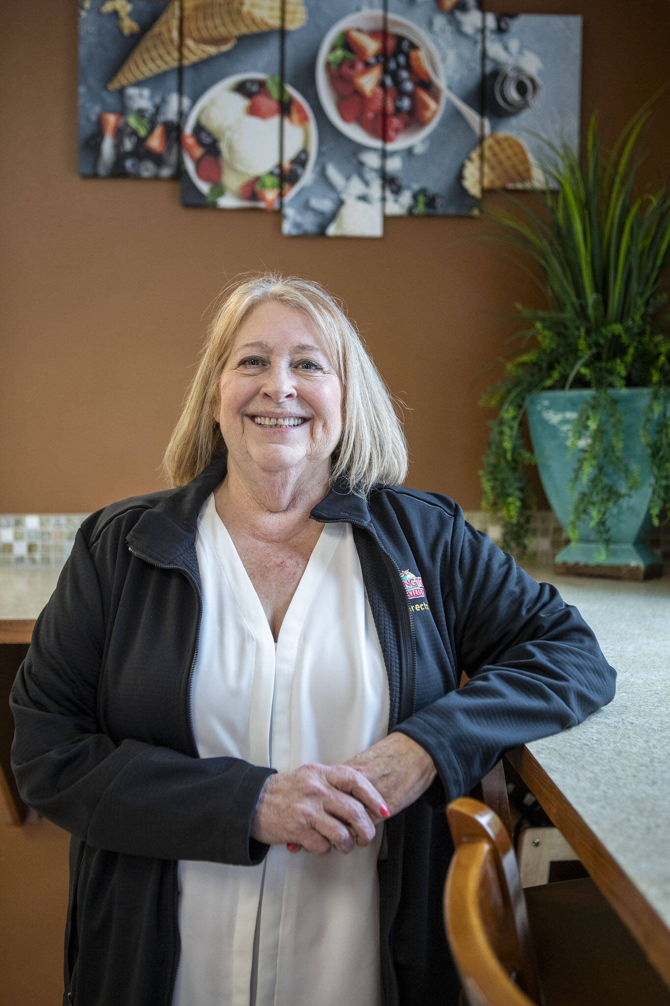 Barb Tolbert poses for a photo at Silver Scoop Ice Cream on Thursday, Feb. 29, 2024 in Arlington, Washington. (Annie Barker / The Herald)