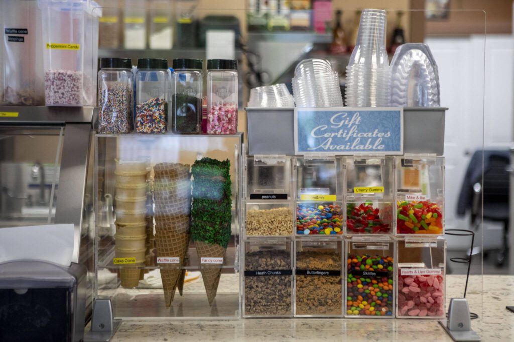 Toppings and cones at Silver Scoop Ice Cream on Thursday, Feb. 29, 2024 in Arlington, Washington. (Annie Barker / The Herald)
