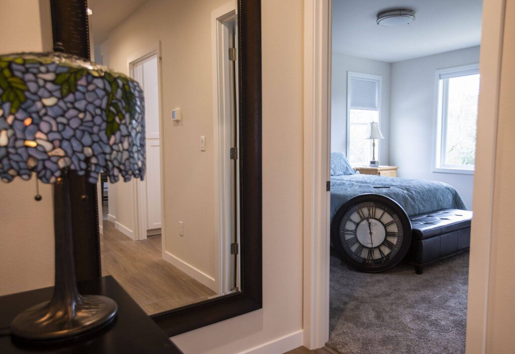 The master suite and hallway of Olin’s final home build on Wednesday, March 20, 2024 in Everett, Washington. (Olivia Vanni / The Herald)

