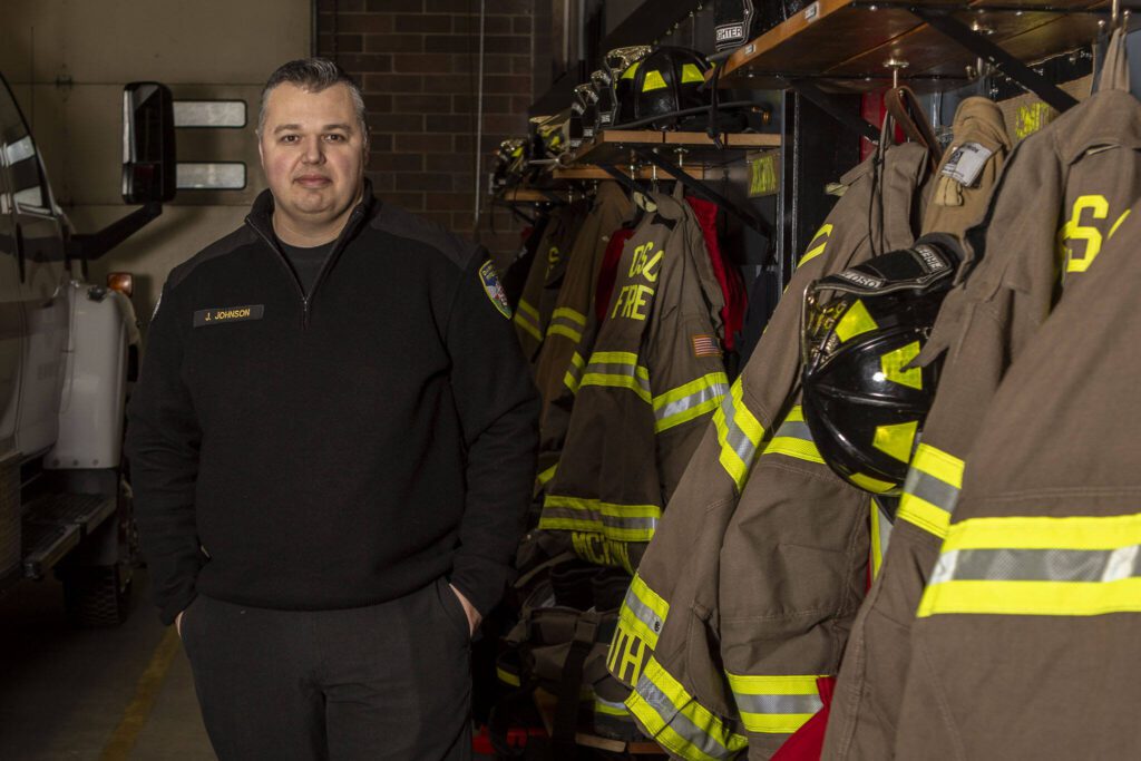 Joel Johnson, Oso fire chaplain and Darrington fire chief, poses for a photo at the Oso Fire Station on Monday, Feb. 26, 2024, near Oso, Washington. (Annie Barker / The Herald)
