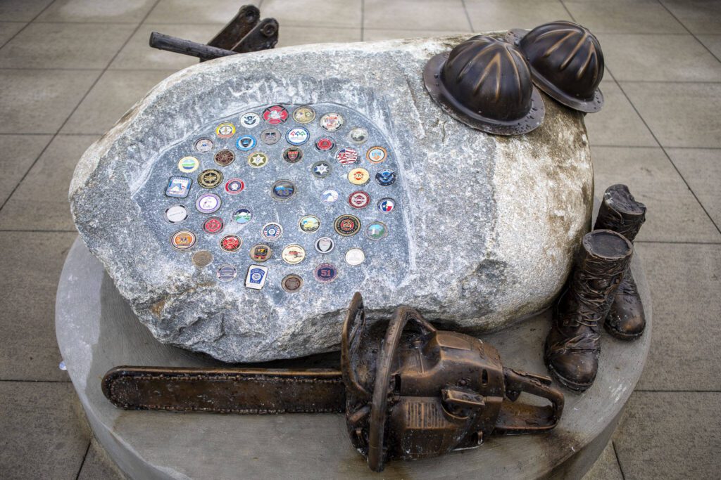 A tribute to first responders at the Oso Landslide Memorial on Monday, Feb. 26, 2024, near Oso, Washington. (Annie Barker / The Herald)
