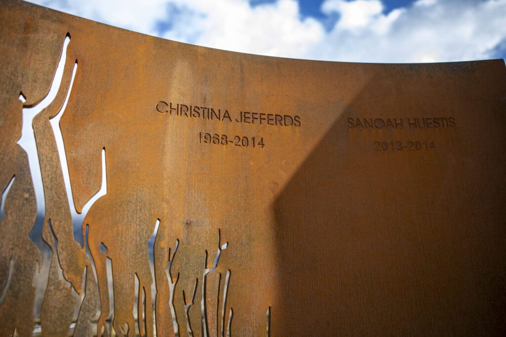 A custom-made tribute to Christina Jefferds and Sanoah Huestis, who both died in the mudslide, at the Oso Landslide Memorial on Monday, Feb. 26, 2024, near Oso, Washington. (Annie Barker / The Herald)
