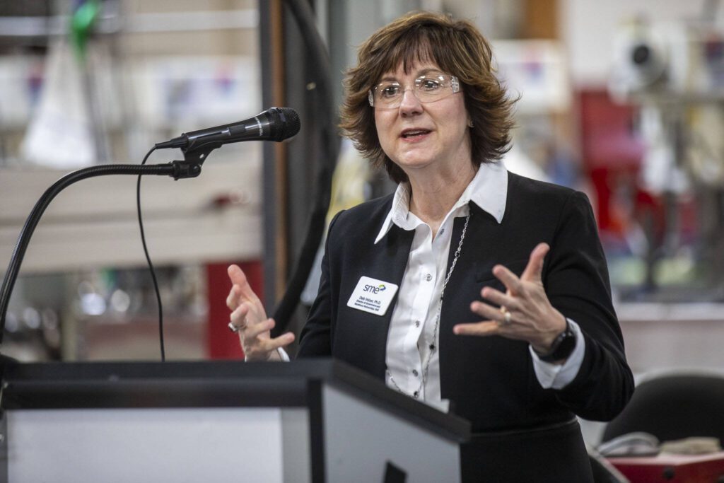 Director of Government and Workforce Partnerships Deb Volzer speaks during a press conference and tour at the Washington Aerospace Training and Research Center on Wednesday, March 6, 2024 in Everett, Washington. (Annie Barker / The Herald)
