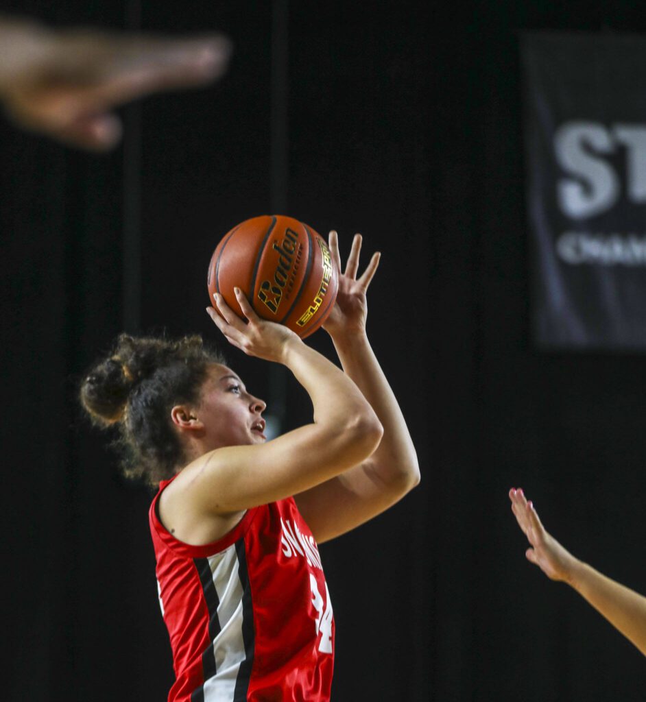 Snohomish’s Tyler Gildersleeve-Stiles (34) shoots the ball during a 3A semifinal game between Snohomish and Mead at the Tacoma Dome on Friday, March 1, 2024 in Tacoma, Washington. Snohomiosh fell, 56-50. (Annie Barker / The Herald)
