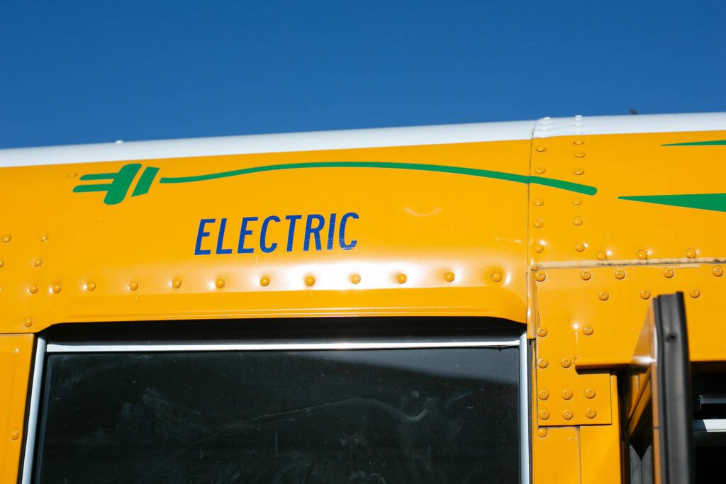 Snohomish School District’s electric school bus features a few small decals that differentiate it from propane and diesel buses Thursday, March 7, 2024, at the district bus depot in Snohomish, Washington. (Ryan Berry / The Herald)
