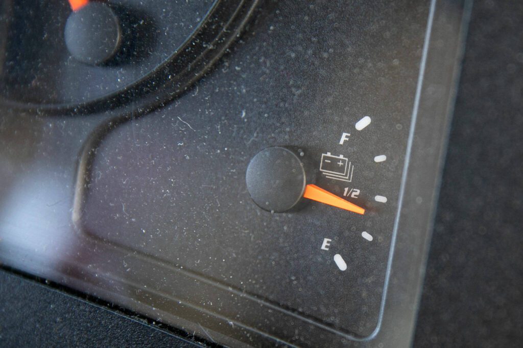 The battery gauge on Snohomish School District’s lone electric school bus replaces the typical fuel gauge of most buses Thursday, March 7, 2024, at the district bus depot in Snohomish, Washington. (Ryan Berry / The Herald)
