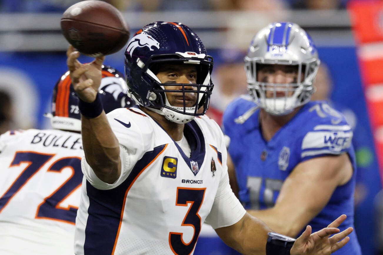 FILE - Denver Broncos quarterback Russell Wilson (3) throws during the first half of an NFL football game against the Detroit Lions, Dec. 16, 2023, in Detroit. The Broncos told Wilson, Monday, March 4, 2024, that they are going to release him next week, just 18 months after signing the Super Bowl-winning quarterback to a five-year, $242 million contract extension. (AP Photo/Duane Burleson, File)