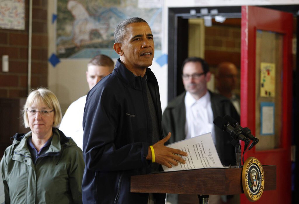 President Obama speaks at the Oso Fire Department after touring the slide area and meeting with victims and their families in Oso, Washington. on April 22, 2014. (Genna Martin / The Herald)
