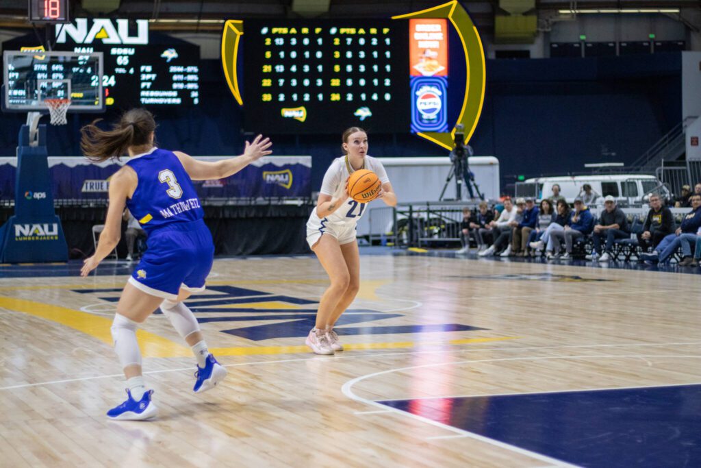 Northern Arizona University’s Emily Rodabaugh sets up for a 3-pointer during a game in Flagstaff, Ariz. The Archbishop Murphy High School alum broke the school’s career 3-point record this season. (Photo courtesy of Northern Arizona University)
