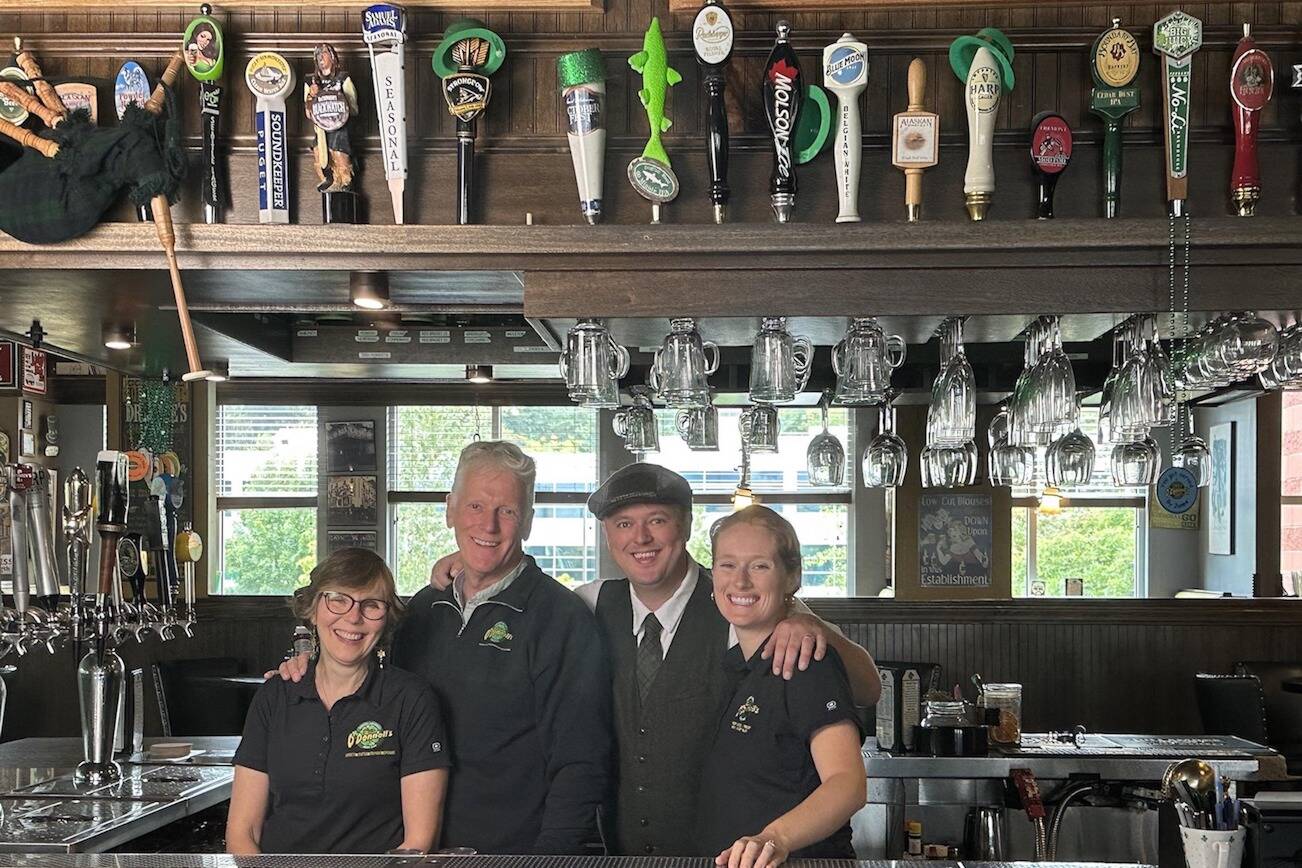 The O'Donnell family pose for a photo in one of the Shawn O'Donnell's restaurants. Left, Tina O'Donnell, Shawn O'Donnell, Shawn O'Donnell Jr. and Sophie Taylor.