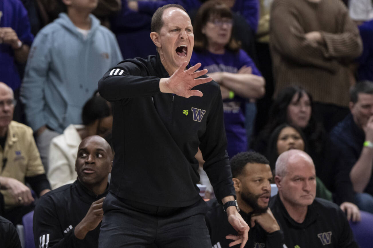 Washington coach Mike Hopkins yells to the team during the second half of the team's NCAA college basketball game against California, Saturday, Feb. 17, 2024, in Seattle. California won 82-80. (AP Photo/Stephen Brashear)