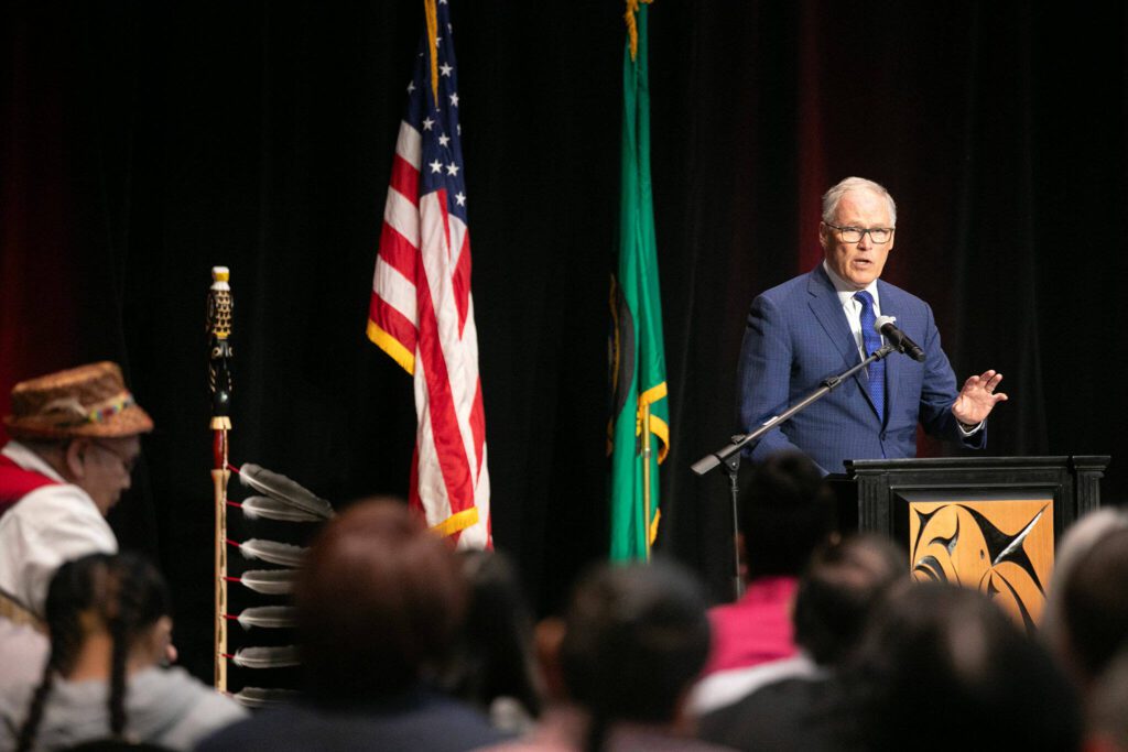 Gov. Jay Inslee addresses a packed room before signing a number of bills into law on Tuesday, March 19, 2024, at Tulalip Casino’s Orca Ballroom in Tulalip, Washington. (Ryan Berry / The Herald)
