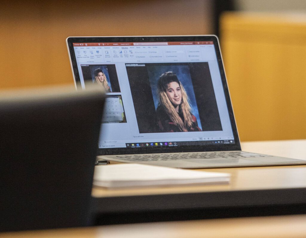 A photograph Melissa Lee is seen on a laptop during the murder trial of Alan Dean at the Snohomish County Courthouse on Tuesday, March 19, 2024 in Everett, Washington. (Olivia Vanni / The Herald)
