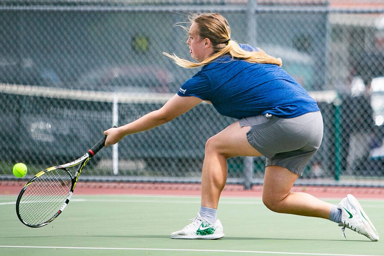 Shorewood’s Rylie Gettmann goes after the ball during the 3A District championship match against Edmonds-Woodway’s junior Paige Oliver on Wednesday, May 18, 2022 in Snohomish, Washington. (Olivia Vanni / The Herald)