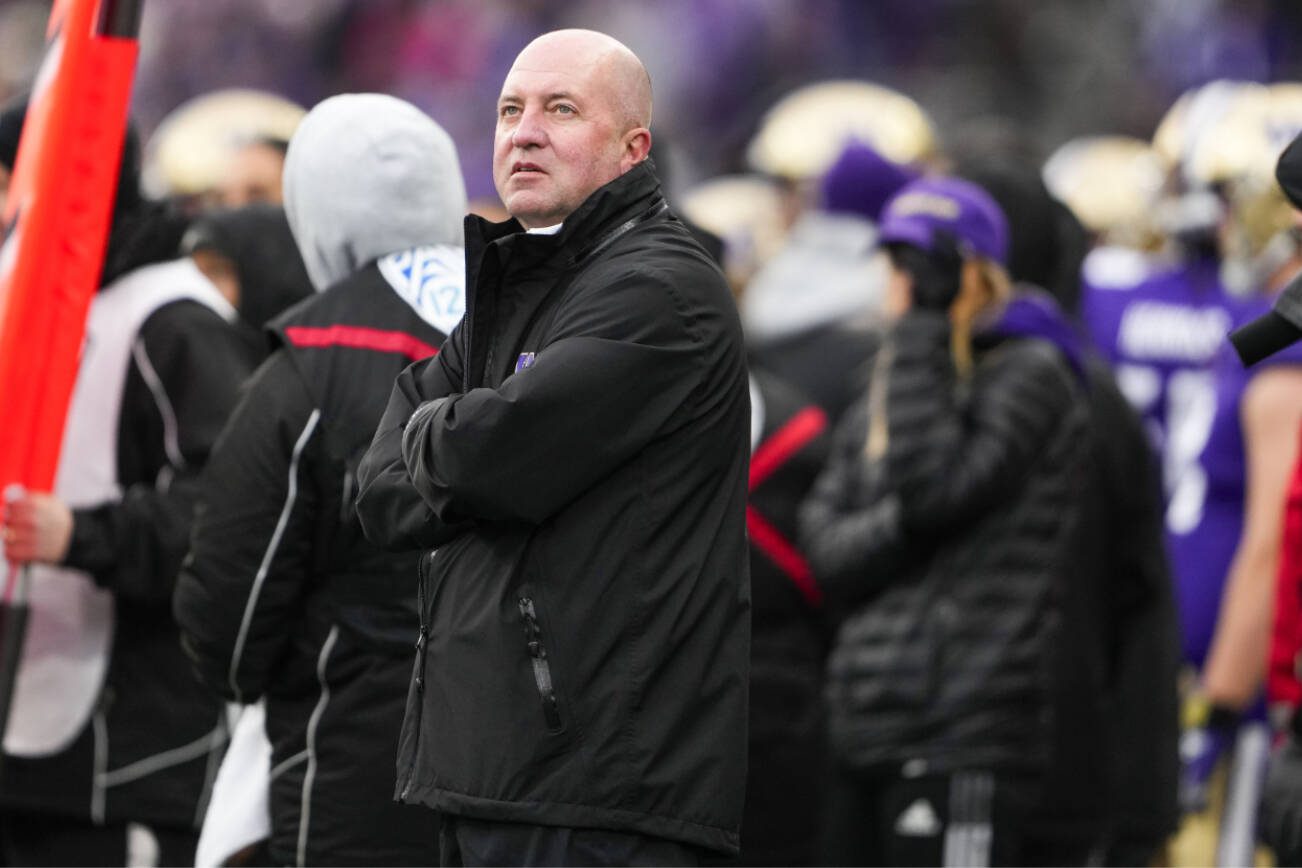 Washington athletic director Troy Dannen looks on from the sideline during the second half of an NCAA college football game against Utah, Saturday, Nov. 11, 2023, in Seattle. Washington won 35-28. (AP Photo/Lindsey Wasson)