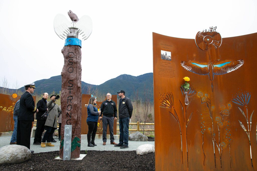 Gov. Jay Inslee tours the Oso Slide Memorial following the ten-year remembrance of the Oso landslide on Friday, March 22, 2024, at the Oso Landslide Memorial in Oso, Washington. (Ryan Berry / The Herald)
