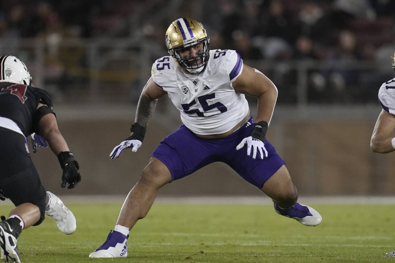 Washington offensive lineman Troy Fautanu (55) during a game against Stanford in on Oct. 28, 2023, in Stanford, Calif. (AP Photo/Jeff Chiu)