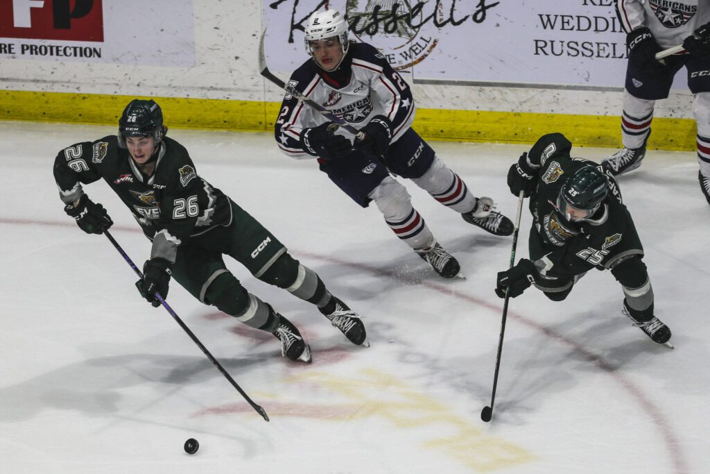 Silvertips’ Andrew Petruk (26) moves with the puck during a game between against the Tri-City Americans at the Angel of the Winds Arena on Sunday in Everett. (Annie Barker / The Herald)
