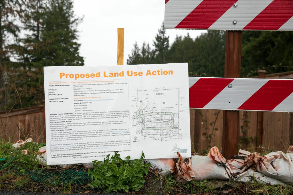 A public notice about proposed rezoning nearby is posted at the end of 108th St. NE in the Hillside Vista luxury development Monday, March 25, 2024, in Lake Stevens, Washington. (Ryan Berry / The Herald)
