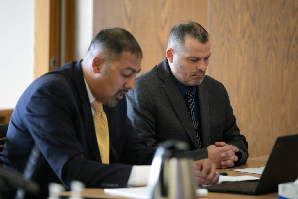 Former Snohomish County sheriff’s deputy Jeremie Zeller, right, appears in court for sentencing on multiple counts of misdemeanor theft Wednesday, March 27, 2024, at Snohomish County Superior Court in Everett, Washington. (Ryan Berry / The Herald)
