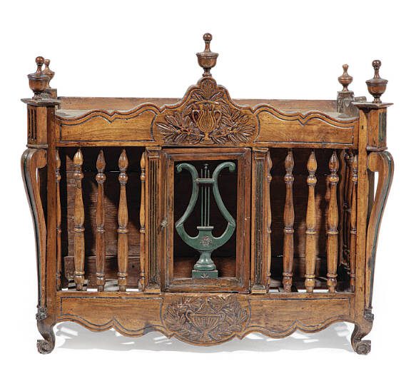 Would you want to give something as elaborate as this a name as mundane as “bread box”? A French Provincial piece practically demands the French name panetiere.