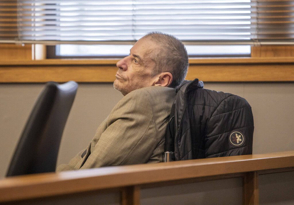 Alan Dean listens to T.J. Peters testify at the Snohomish County Courthouse on Tuesday, March 26, 2024 in Everett, Washington. (Olivia Vanni / The Herald)
