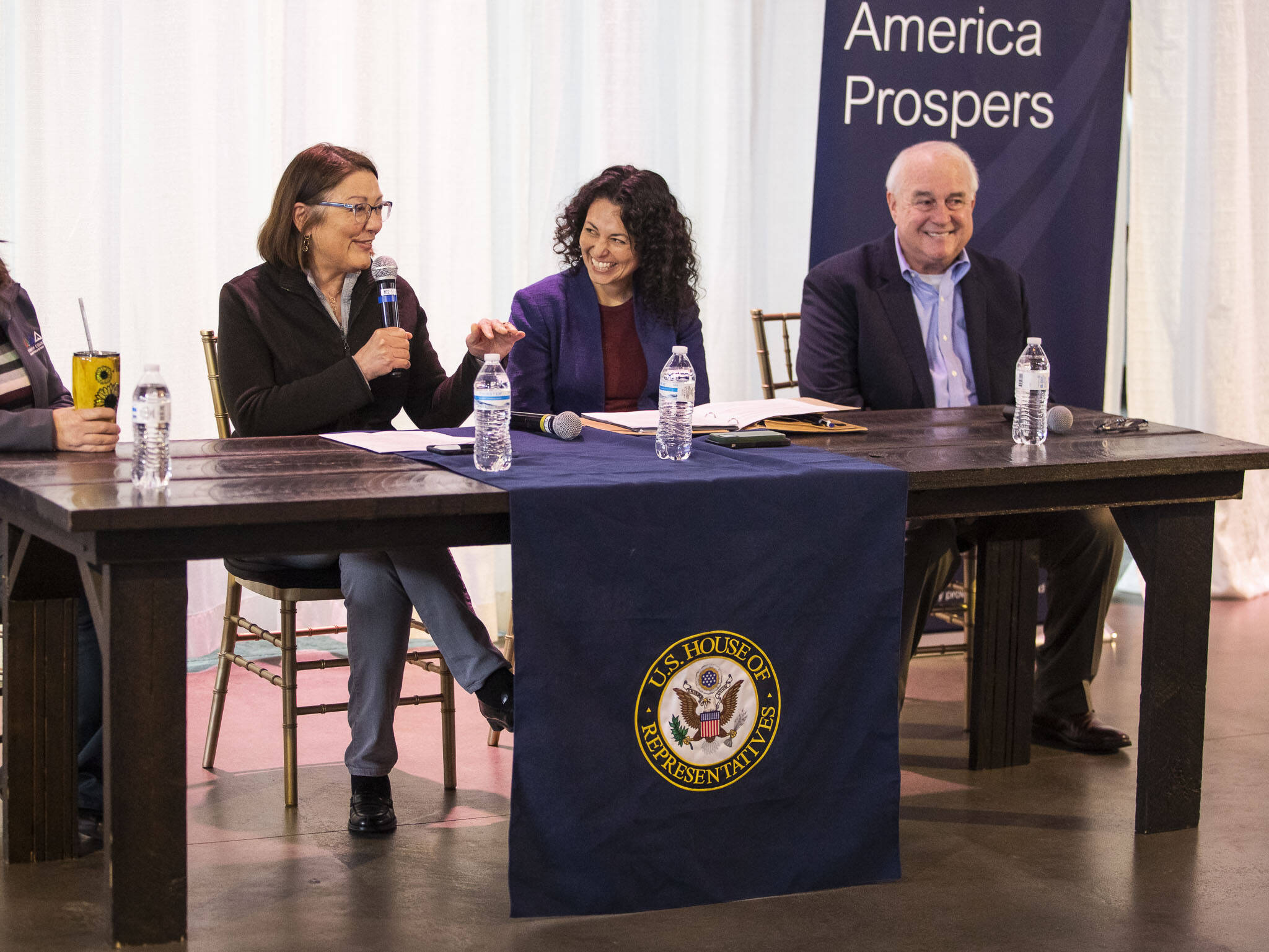 Rep. Suzan DelBene, left, introduces Xichitl Torres Small, center, Undersecretary for Rural Development with the U.S. Department of Agriculture during a talk at Thomas Family Farms on Monday, April 3, 2023, in Snohomish, Washington. (Olivia Vanni / The Herald)