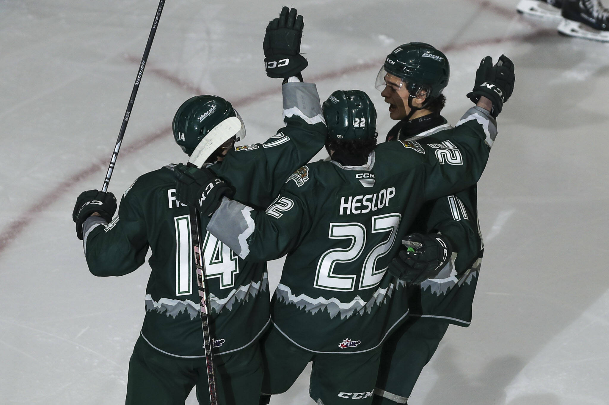 Silvertips players celebrate during a game between against the Tri-City Americans at the Angel of the Winds Arena on Jan. 21, 2024, in Everett. (Annie Barker / The Herald)
