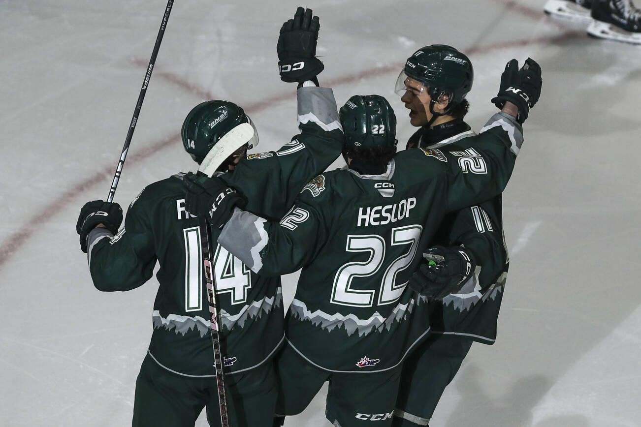 Silvertips players celebrate during a game between the Everett Silvertips and Tri-City Americans at the Angel of the Winds Arena on Sunday, Jan. 21, 2024. The Silvertips won, 5-3. (Annie Barker / The Herald)