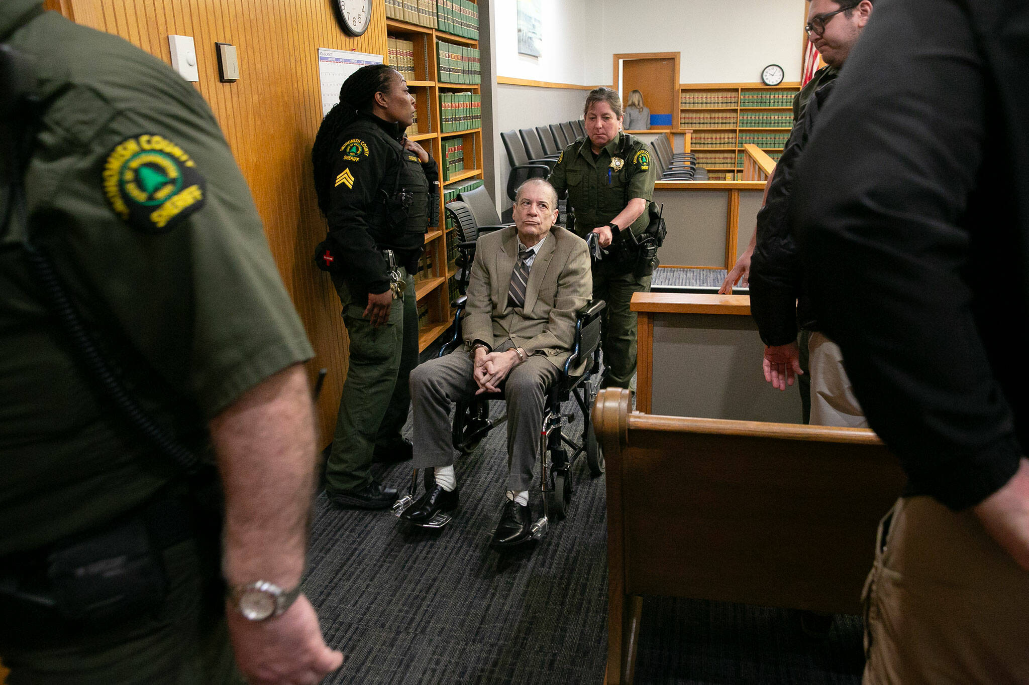 Alan Dean is removed from the courthouse after being convicted of the 1993 murder of 15-year-old Bothell girl Melissa Lee on Thursday, March 28, 2024, at Snohomish County Superior Court in Everett, Washington. (Ryan Berry / The Herald)