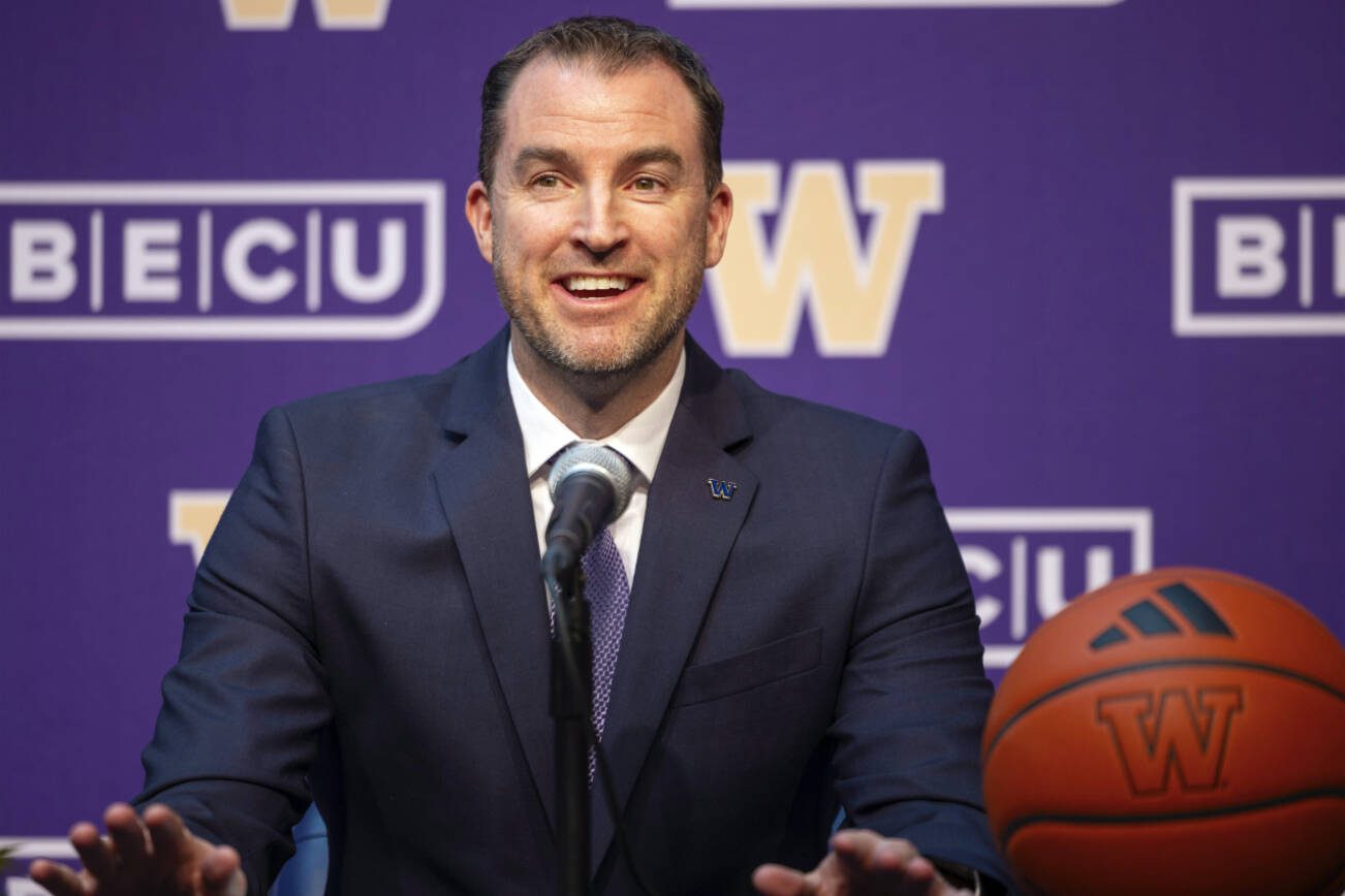 University of Washington's new men's basketball coach Danny Sprinkle meets the news media, Wednesday, March 27, 2024 in Seattle. (Ken Lambert/The Seattle Times via AP)
