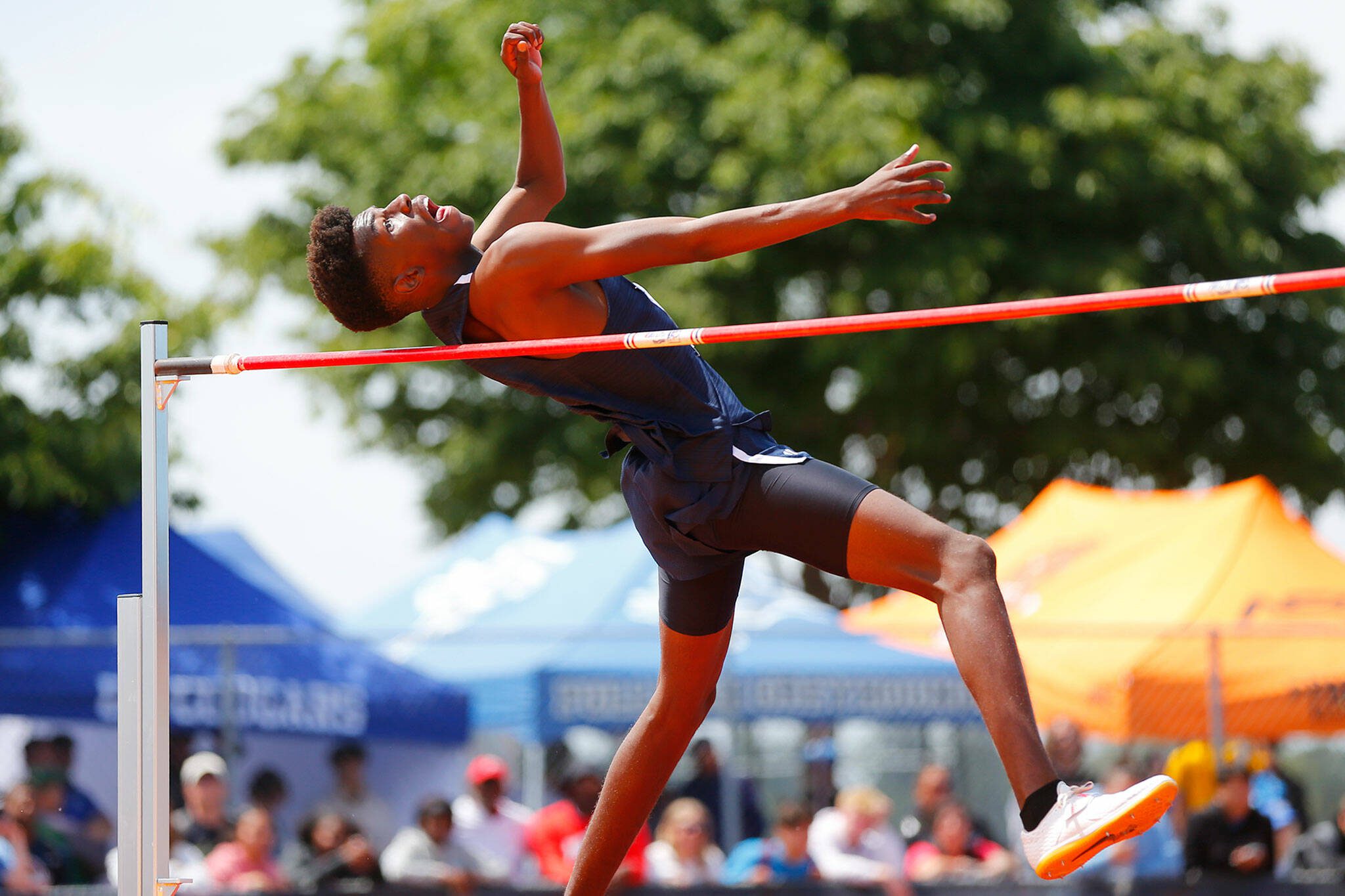 Everett’s Shukurani Ndayiraglje attempts to hit a 6-foot 6-inch jump in the Class 3A boys high jump before claiming second place during the state track and field championships May 27, 2023, at Mount Tahoma High School in Tacoma. (Ryan Berry / The Herald)