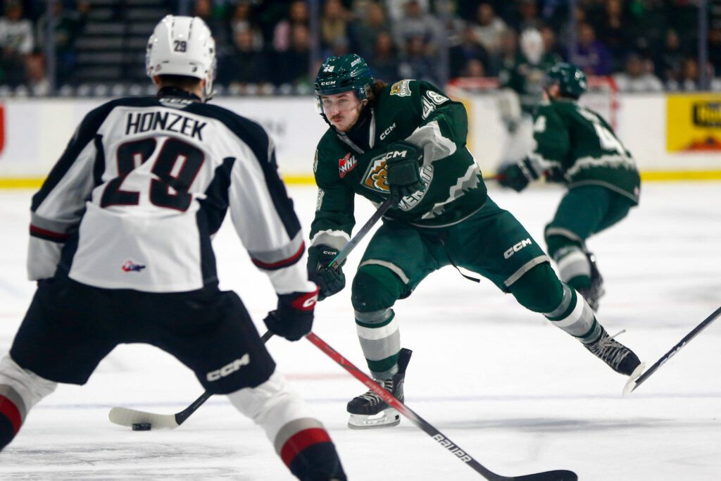 Everett Silvertips forward Caden Brown tries to get the puck to the net against the Vancouver Giants during the 2024 playoff opener on Friday, March 29, 2024, at Angel of the Winds Arena in Everrett, Washington. (Ryan Berry / The Herald)
