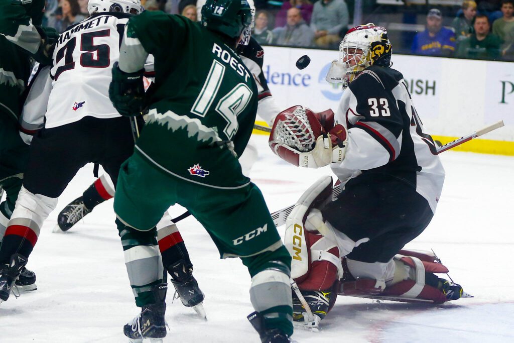 Vancouver Giants goalie Brett Mirwald gives up a second chance but prevents a goal during the 2024 playoff opener against the Silvertips on Friday, March 29, 2024, at Angel of the Winds Arena in Everrett, Washington. (Ryan Berry / The Herald)
