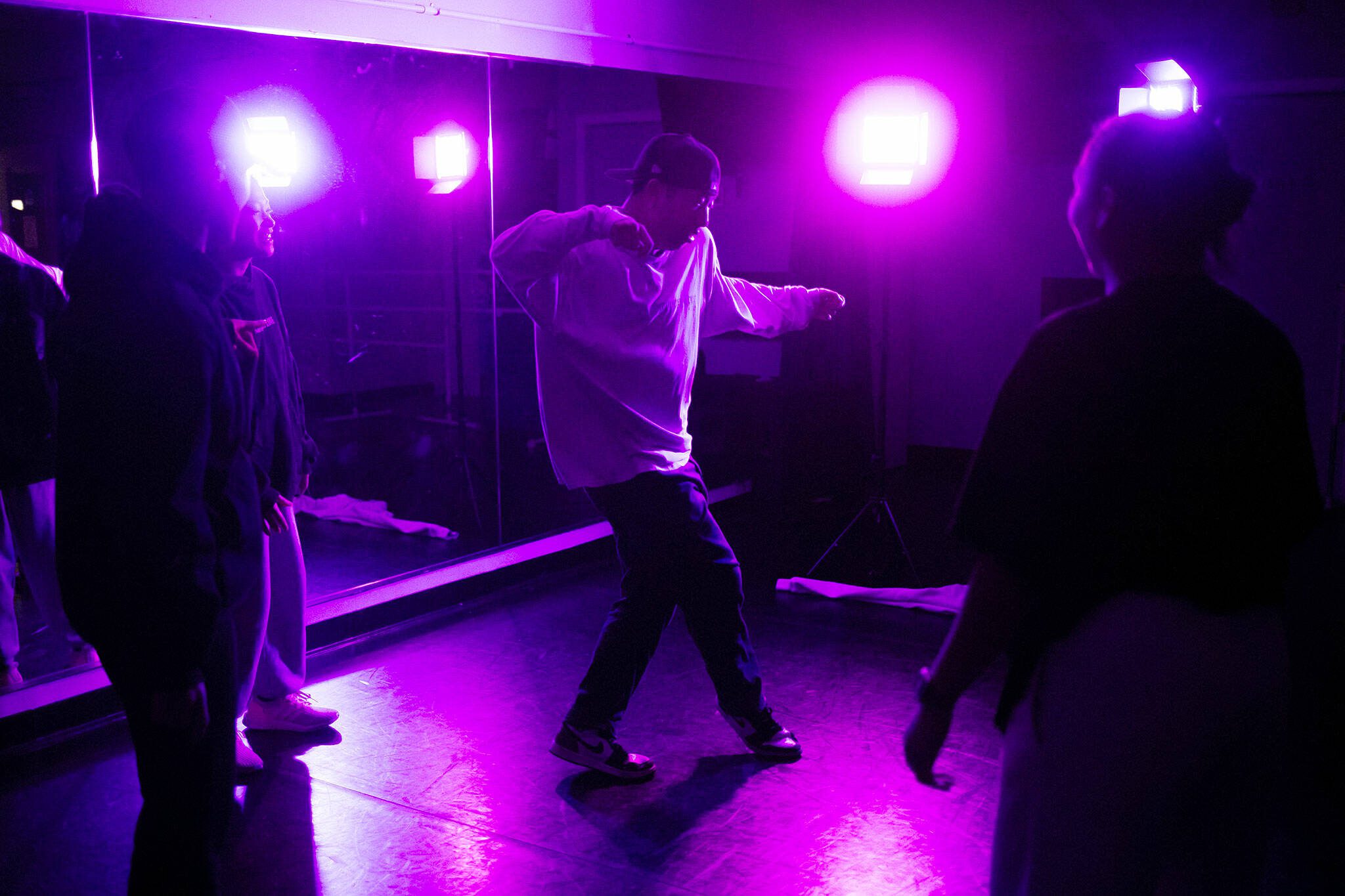 Jon Kim freestyles during a RTHMZ rehearsal. He started off in traditional Korean dance as a child in Lynnwood, and later trained with local choreography crews. (Ryan Berry / The Herald)
