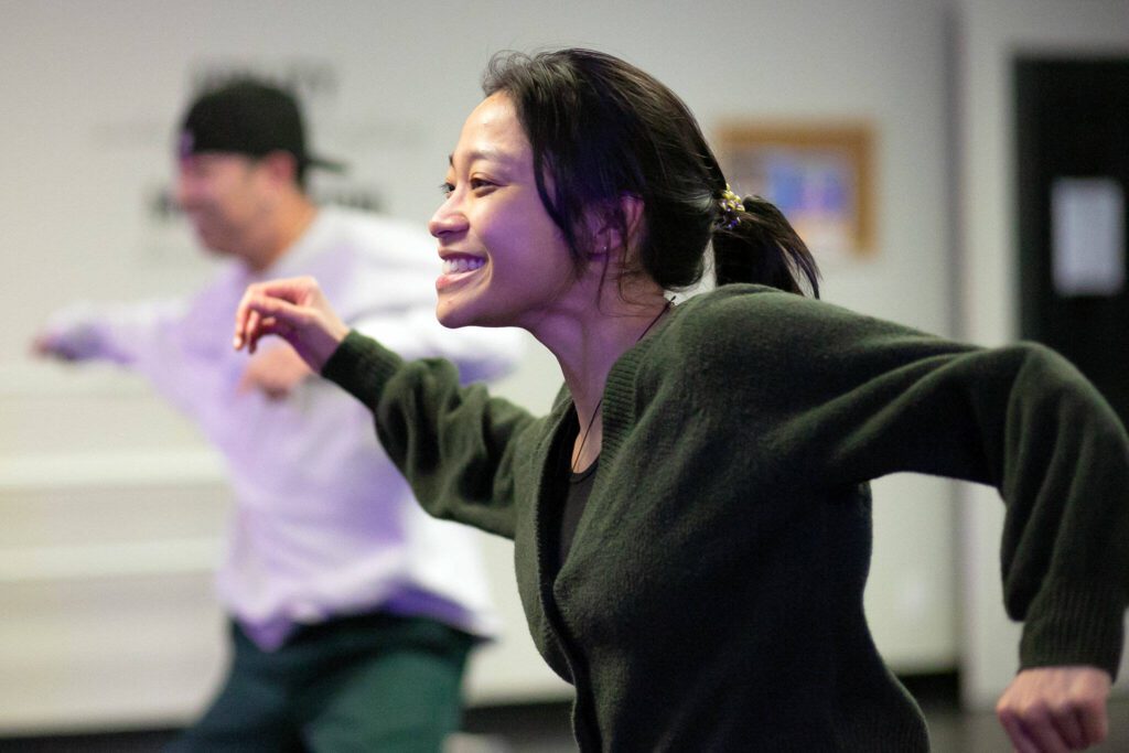 Lauren Mangibin works in step with her fellow RTHMZ teammates. “I think RTHMZ is definitely about building and creating local community,” she says. (Ryan Berry / The Herald)

