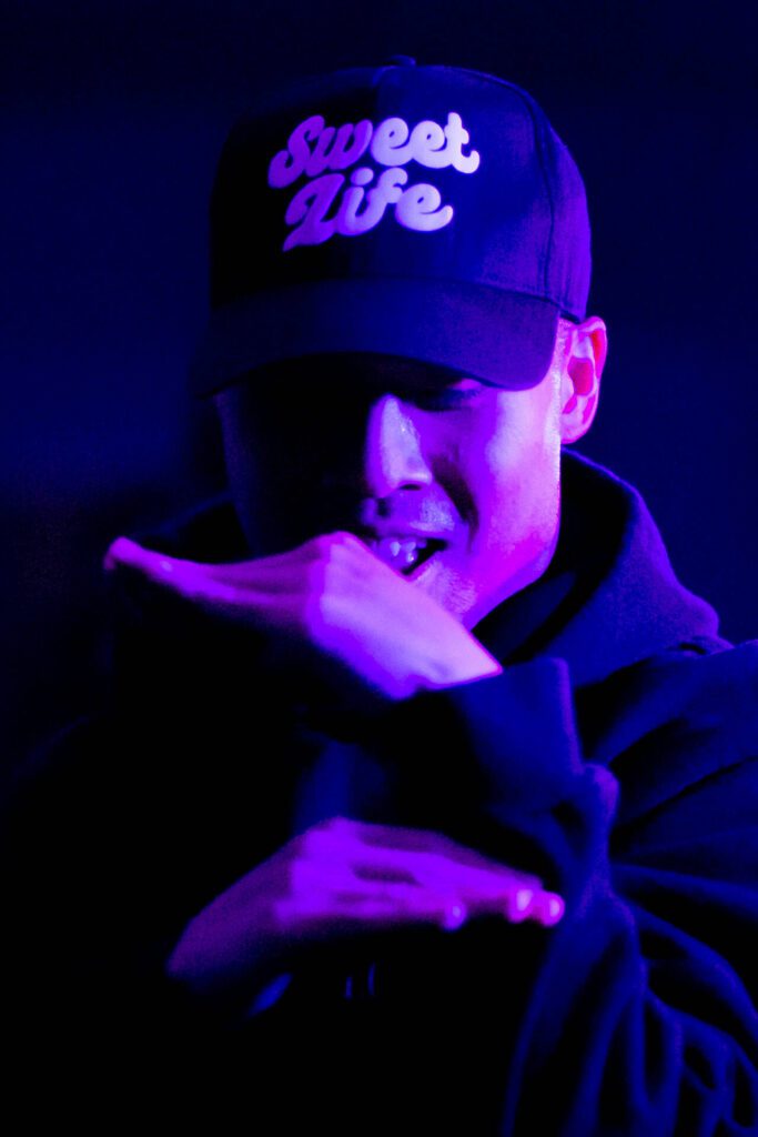 Director Pon Nuth freestyles during a RTHMZ rehearsal Monday, Jan. 22, 2024, in Lynnwood, Washington. (Ryan Berry / The Herald)
