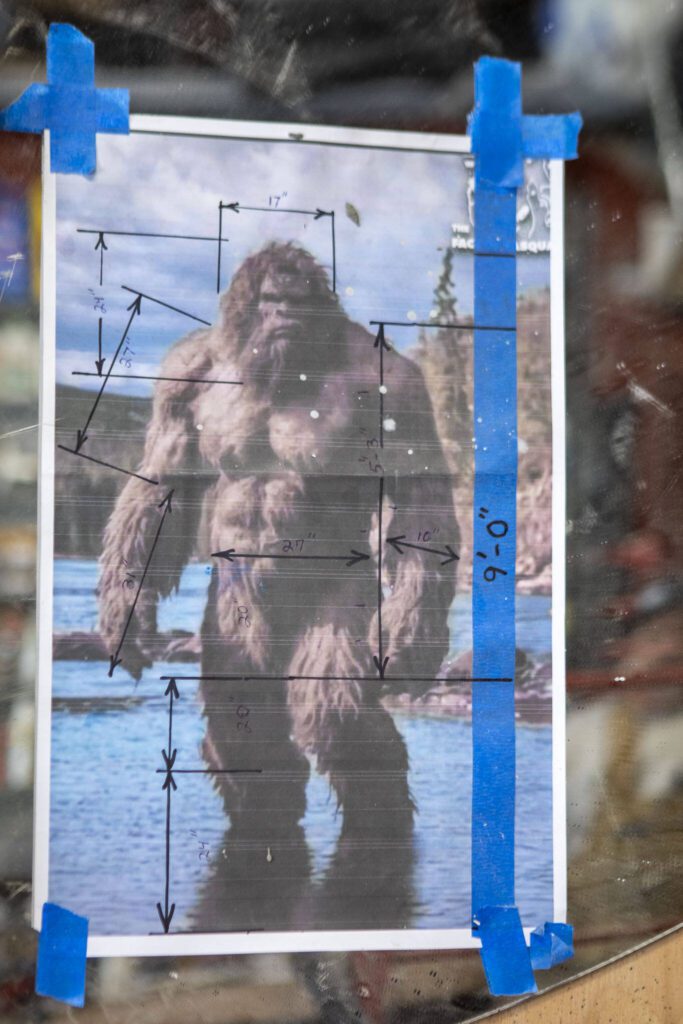 Measurements for a giant Bigfoot creation made by Terry Carrigan, 60, at his home-based Skywater Studios on Sunday, April 14, 2024 in Monroe, Washington. (Annie Barker / The Herald)
